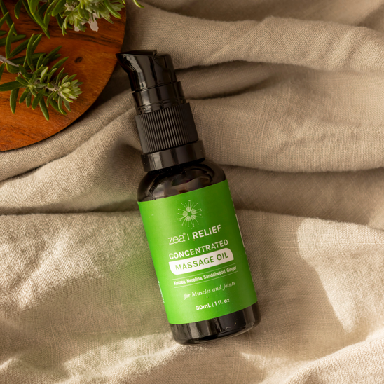 Kunzea Concentrated Massage Oil, styled product photograph 2